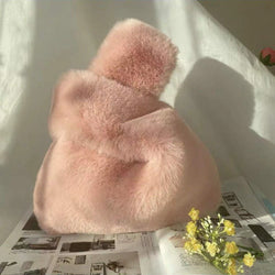 THE PLUSH PINK FUR BAG