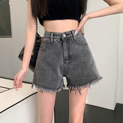 THE DISTRESSED HIGH-RISE DENIM SHORTS